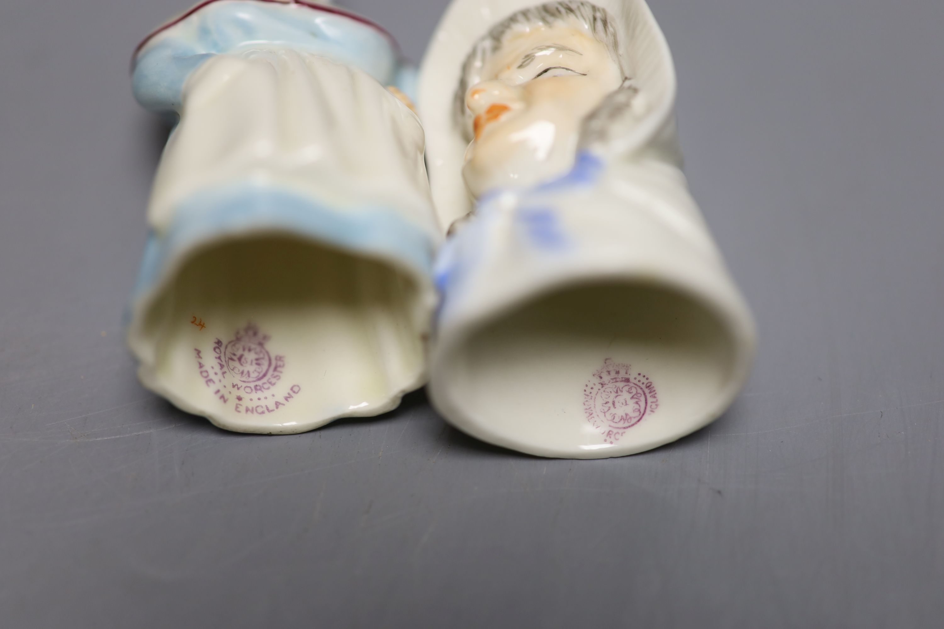 A Royal Worcester candlesnuffer of Mrs Caudle, date mark 1919 and a candlesnuffer of the French Cook, date mark 1925